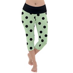 Large Black Polka Dots On Tea Green - Lightweight Velour Capri Yoga Leggings by FashionLane